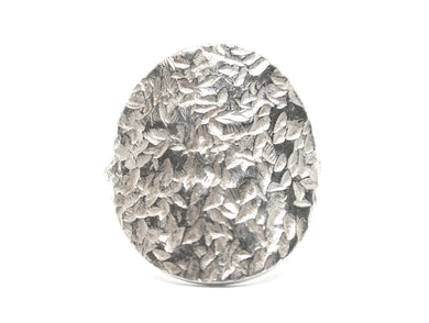 Pladering med mønster i sølv