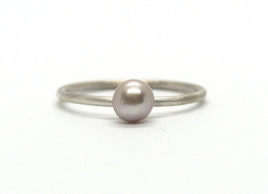 Silver ring with pink pearl