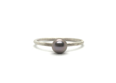 Silver ring with blue pearl