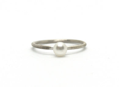 Silver ring with white pearl