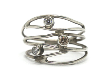 Silver ring with 3 set stones