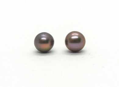 Silver earrings with blue pearls