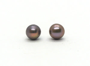 Silver earrings with blue pearls