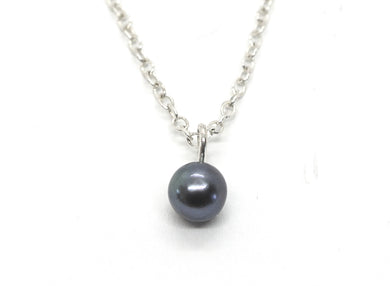 Silver necklace with blue pearl pendant