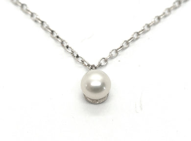 Silver necklace with white pearl pendant