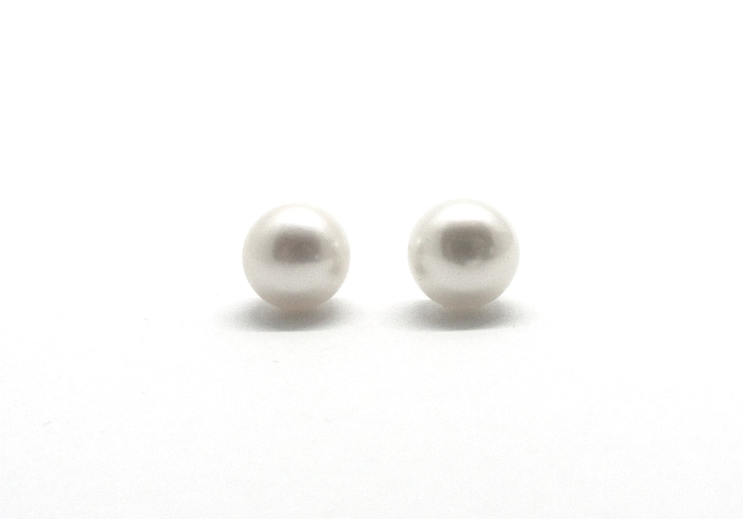 Large white pearl earrings