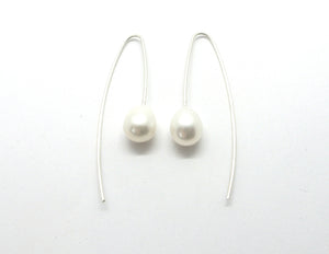 Long earrings with large white freshwater pearls