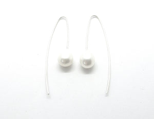 Long earrings with large white freshwater pearls
