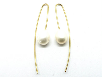 Gold-plated long earrings with large white freshwater pearls